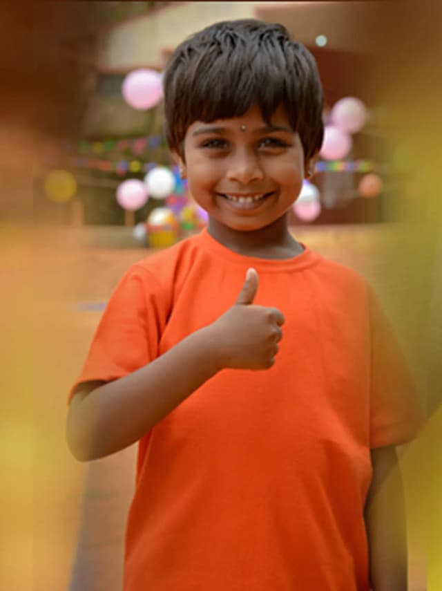 Child with Holi colors